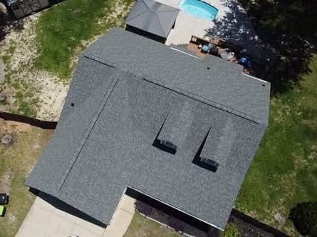 Aerial view of a completed architectural shingle roof